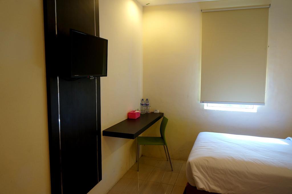 Quin Centro Hotel Palembang Room photo