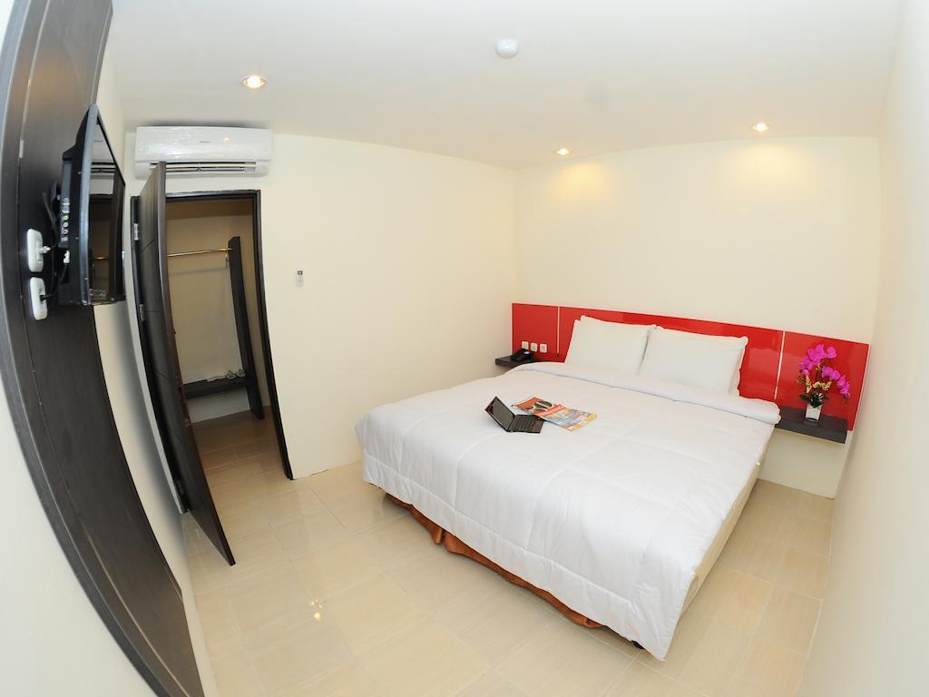 Quin Centro Hotel Palembang Exterior photo
